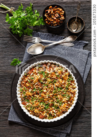 mushrooms ground meat casserole in dish, top view 105873330