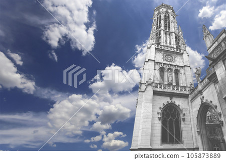 Great gothic church of Saint Germain l Auxerrois (against the background of sky with clouds), Paris, France 105873889