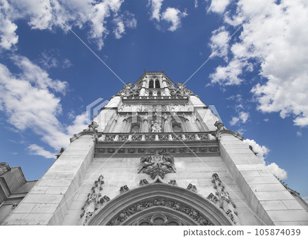 Great gothic church of Saint Germain l Auxerrois (against the background of sky with clouds), Paris, France 105874039