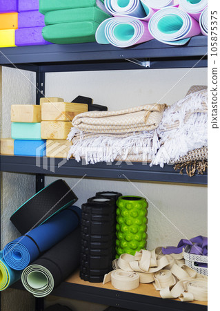 close-up of a colorful yoga mat, sports equipment,the concept of sports and a healthy lifestyle close-up of a colorful yoga mat, sports equipment,the concept of sports and a healthy lifestyle 105875375