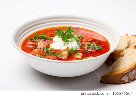 Cold soup with sour cream in a plate with bread 105875504