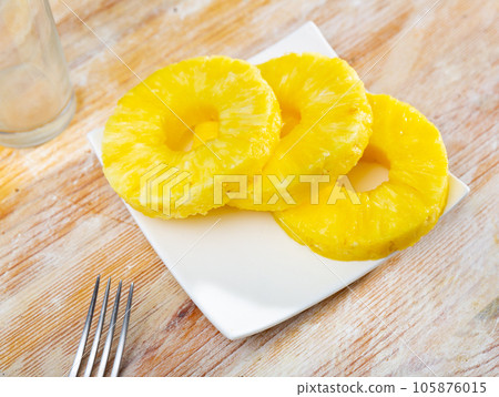 Beautifully laid out canned pineapple on a plate 105876015