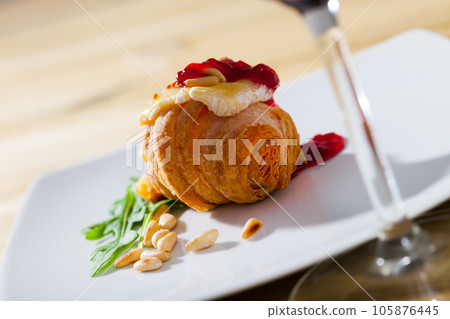 Mini croissant with camembert, jam, pine nuts Mini croissant with camembert, jam, pine nuts 105876445