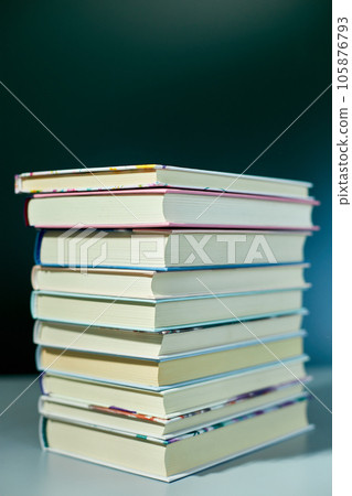 Stack of books on dark backgrounds, World book day 105876793