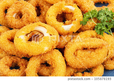 Deep fried squid rings, close up. 105878193