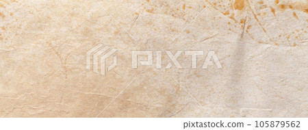 Texture of light beige old craft paper, crumpled background. Vintage grunge surface backdrop. Texture of light beige old craft paper, crumpled background. Vintage grunge surface backdrop. 105879562