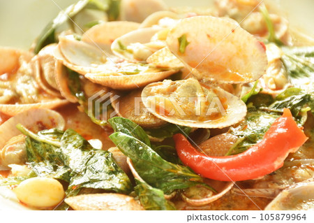 stir fried clams with roasted chili paste on plate stir fried clams with roasted chili paste on plate 105879964