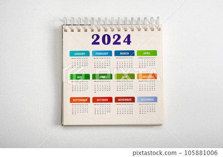 Calendar Year 2024 schedule. colorful 2024 desk calender notepad on light gray background. Resolution, strategy, solution, goal, business and New Year holiday 105881006
