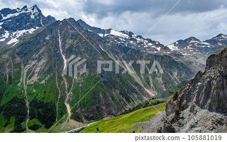 Mountains landscape. snow-capped peaks. Idyllic mountain background. Panoramic view of beautiful mountain landscape 105881019