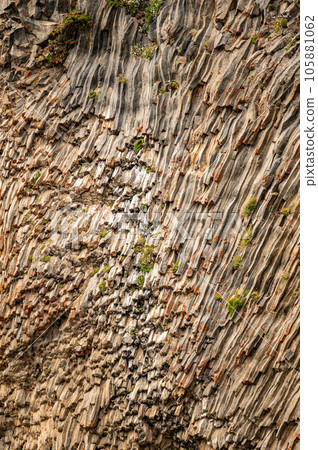 natural stone background texture. rock formation, unusual mountain topography, geological backdrop. Basalt columns formation 105881062