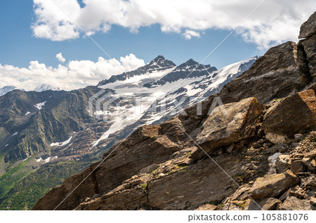 Mountains landscape. snow-capped peaks. Idyllic mountain background. Panoramic view of beautiful mountain landscape 105881076