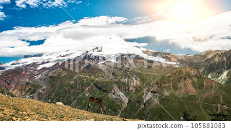 Mountains landscape. snow-capped peaks. Idyllic mountain background. Panoramic view of beautiful mountain landscape 105881083