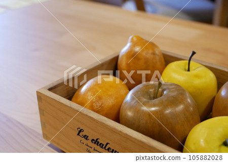 fruit in a wooden box 105882028
