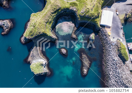 Snaefellsnes peninsula with vibrant sea and rock formation on Atlantic coastal at Arnastapi Snaefellsnes peninsula with vibrant sea and rock formation on Atlantic coastal at Arnastapi 105882754