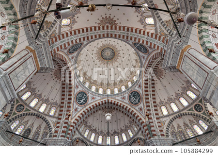 Ceiling of Ottoman Fatih Mosque in Istanbul, Turkey, made up of a series of decorated domes based on Islamic art Ceiling of Ottoman Fatih Mosque in Istanbul, Turkey, made up of a series of decorated domes based on Islamic art 105884299