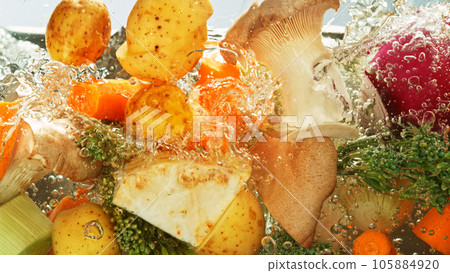 Freeze Motion Shot of Splashing Fresh Vegetable. 105884920