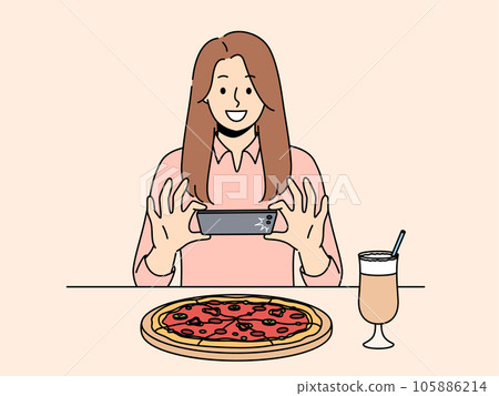 Woman takes picture of pizza on phone, wanting to make post on social network and talk about life 105886214