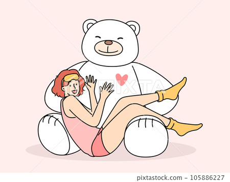 Giant teddy bear near sitting teenage girl in pajamas and sleep mask rejoicing at cute present Giant teddy bear near sitting teenage girl in pajamas and sleep mask rejoicing at cute present 105886227