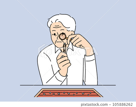 Elderly man jeweler examines diamond through magnifying glass checking gems for authenticity Elderly man jeweler examines diamond through magnifying glass checking gems for authenticity 105886262