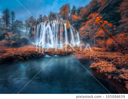Waterfall in red forest in Plitvice Lakes, Croatia in autumn 105886639