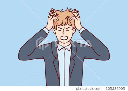 Nervous man tears hair out because of problems in personal life or trouble with work 105886905
