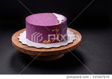 Delicious fresh sweet mousse cake with berry filling Delicious fresh sweet mousse cake with berry filling 105887670