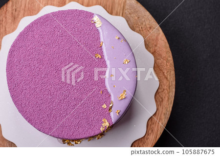 Delicious fresh sweet mousse cake with berry filling 105887675