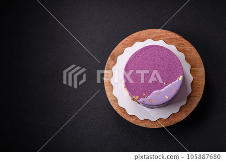 Delicious fresh sweet mousse cake with berry filling Delicious fresh sweet mousse cake with berry filling 105887680