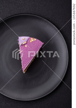 Delicious fresh sweet mousse cake with berry filling Delicious fresh sweet mousse cake with berry filling 105887692