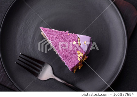 Delicious fresh sweet mousse cake with berry filling 105887694