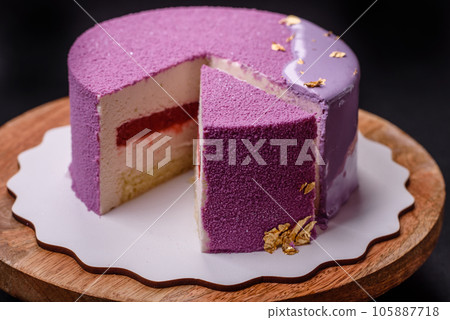 Delicious fresh sweet mousse cake with berry filling 105887718