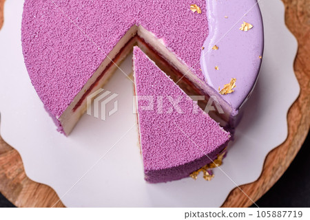 Delicious fresh sweet mousse cake with berry filling 105887719