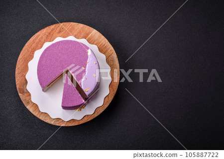 Delicious fresh sweet mousse cake with berry filling 105887722