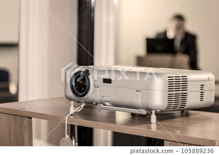 Projector on office table Projector on office table 105889236