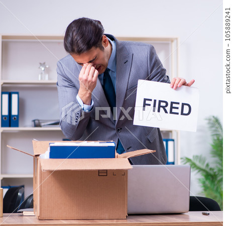 Young male employee being fired from his work Young male employee being fired from his work 105889241