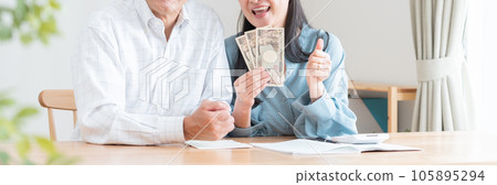 senior couple with money 105895294