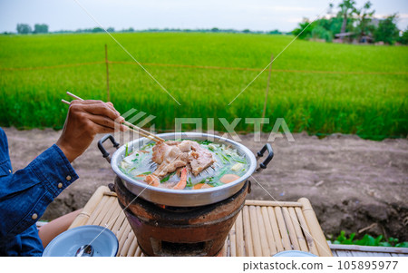 close up of a Thai Korean bbq with a look over - Stock Photo