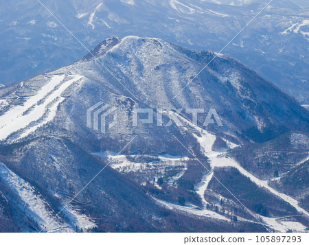 Aerial view of snow-covered Mt. Kosha (taken from Ryuoo Ski Park Sora Terrace) 105897293