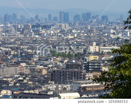 Dense residential area and high-rise buildings seen from the hill Dense residential area and high-rise buildings seen from the hill 105898552