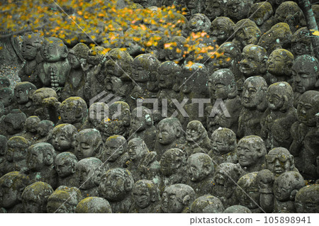 The cute moss-covered Jizo statue at Otagi Nenbutsu-ji Temple and the thoughts of the people The cute moss-covered Jizo statue at Otagi Nenbutsu-ji Temple and the thoughts of the people 105898941
