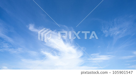 Blue sky and white cirrocumulus clouds texture background. Blue sky on sunny day. Summer sky. Cloud formation. Fluffy clouds. Nice weather in summer season. Weather pattern. Atmospheric phenomenon. 105901547