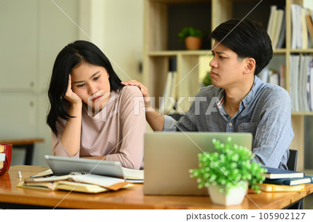 Caring male student consoling his female friend. Friendship, support and youth lifestyle concept 105902127