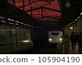 Shinkansen passing each other at the station at dusk 105904190