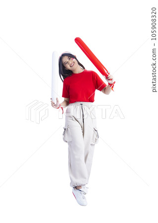 Indonesian girl supporting Indonesian team when competing 105908320