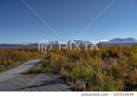Autumn season in Abisko with mountains in background, Abisko, Swedish Lapland, Sweden Autumn season in Abisko with mountains in background, Abisko, Swedish Lapland, Sweden 105910694