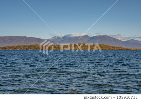 Autumn season in Abisko with Lake Tornetraesk in background, taken from Bjoerkliden, Swedish Lapland, Sweden 105910713