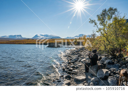 Autumn season in Abisko with Lake Tornetraesk in background, taken from Bjoerkliden, Swedish Lapland, Sweden 105910716
