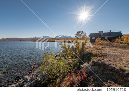Autumn season in Abisko with Lake Tornetraesk in background, taken from Bjoerkliden, Swedish Lapland, Sweden 105910738