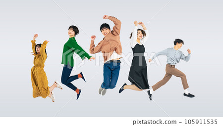 A group of young people jumping Generation Z 105911535