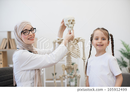 Arabian GP playing with skull while kid staying in hospital Arabian GP playing with skull while kid staying in hospital 105912499